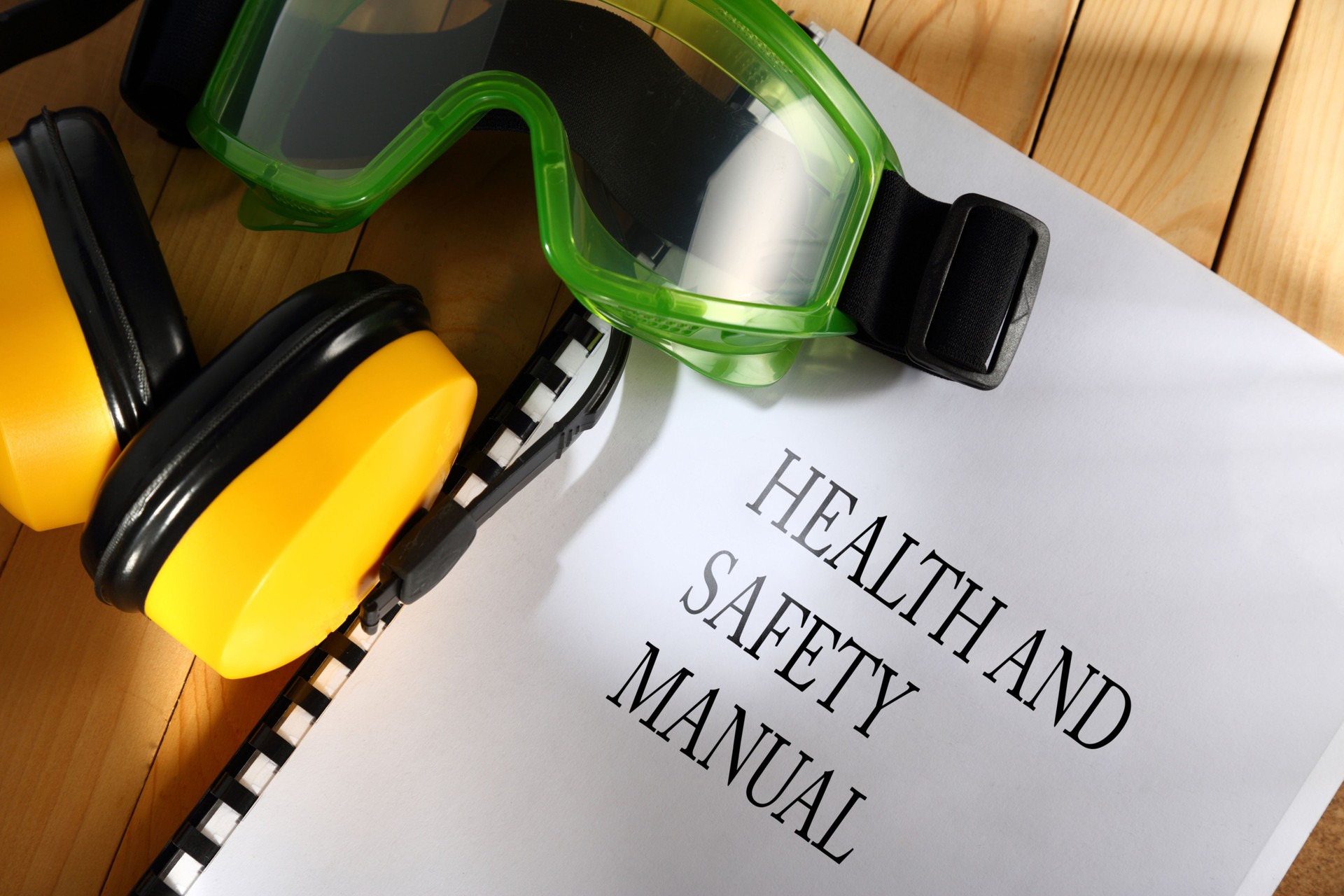 Safety manual with goggles and earphones